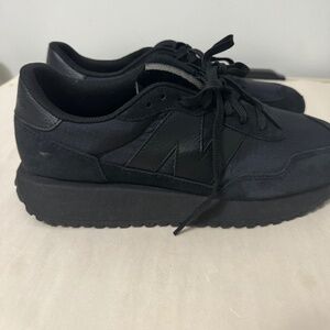New Balance, size 9.5, and color is black-noir